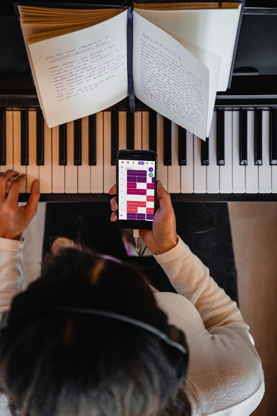 Piano learner developing hand coordination and musical skills